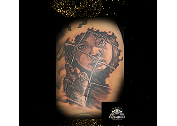 Farbeffekt Tattoo & Piercing