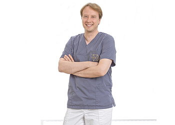 Prof. Dr. Alexander Hassel - Zahnmedizinische Praxisklinik Mannheim