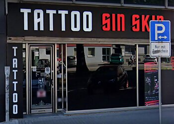 Sin Skin Tattoo Art photo Sin Skin Tattoo Art