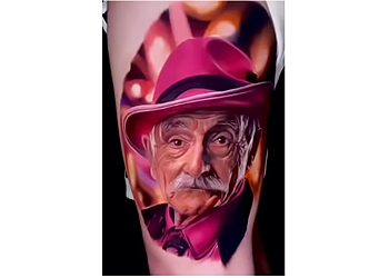 The Joker Tattoo & Piercing Gallery